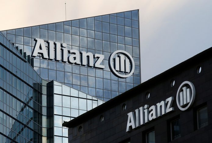 The logo of Europe's biggest insurer Allianz SE is seen on the company tower at La Defense business and financial district in Courbevoie